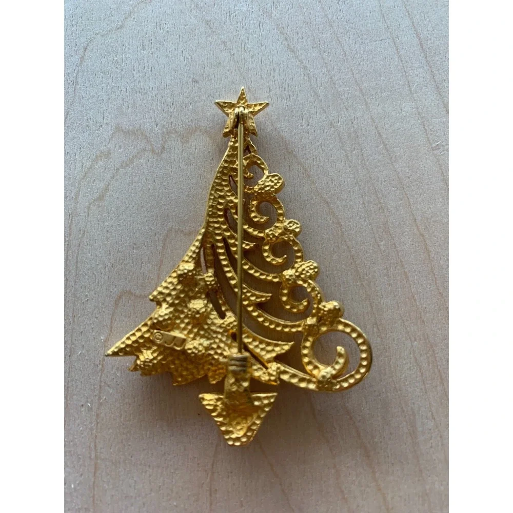 JJ Christmas Brooch Mod Swirl Tree Rhinestone Goldtone Pin